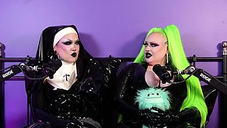 Latex mask lesbian babes have strapon sex