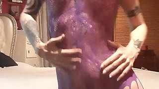 Stripping in a Purple Fishnet Crotchles