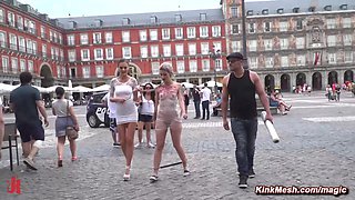 Blond hair girl wrapped in plastic in public