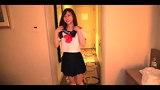 Japanese schoolgirl having sex with her buddy at the hotel room