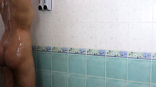 Thai teenager showers, showing off her pink nipples and smooth vagina. Real Thai Solo