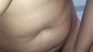 My neighbor is naked while playing with a squirrel.