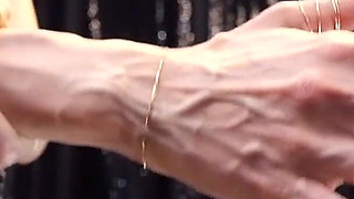 Rebecca Diamante Shows Her Hands' Veins in Topless