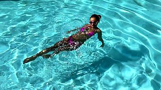 Monika Fox Poses In Pink Bikini And Swims In Pool Surrounded