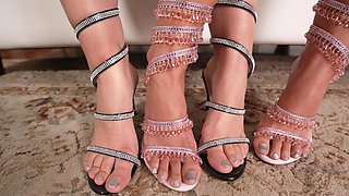Two women with amazing feet are showing off their feet