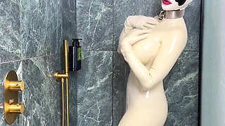Latex Cow Undressing Under the Shower