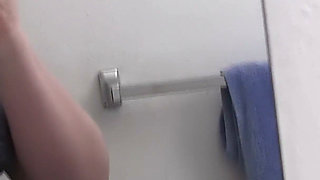 Busty Redhead in Glasses Films Herself Naked in the Bathroom Mirror