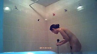 Charming asian naked in the shower