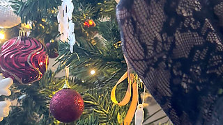 Playing with a christmas three with my legs in stockings