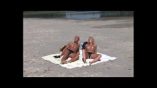 Hot Fit MILF Have Sex on the Beach with Her Bald Big Cock Husband