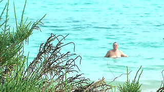 Watching on the beach as Isa has fun