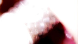 Glamorous doll with red lips Kitty Sixx plays with her shaved pussy