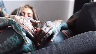 Gorgeous tattooed girl fucks her ass with a big dildo